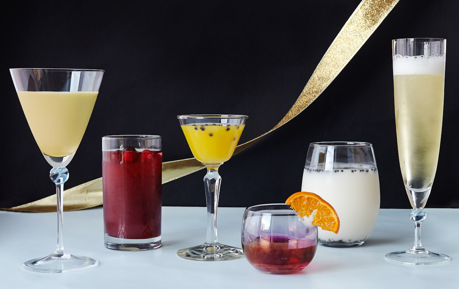 A collection of holiday cocktails from around the world and where to find them in Queens.