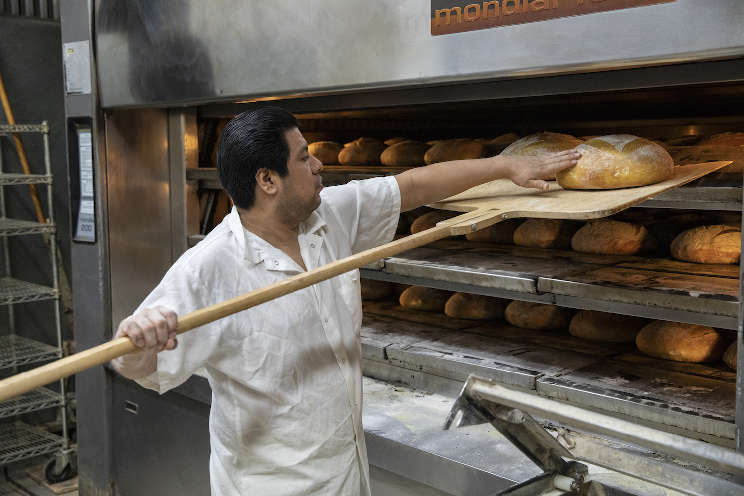 Bread in the oven at Gian Piero Bakery in Astoria, Queens, New York,