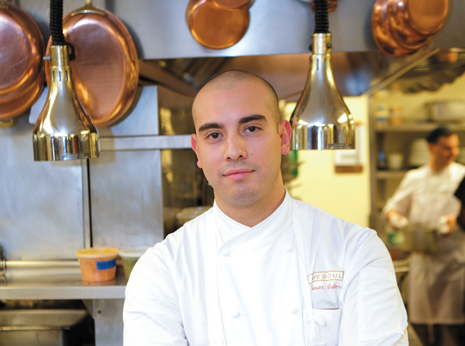 César Gutiérrez cooking at Café Boulud in New York City.