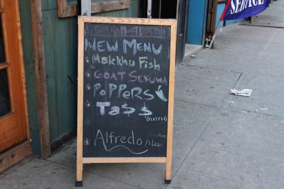 The menu at While in Kathmandu, at his father's first restaurant in Ridgewood, Queens.