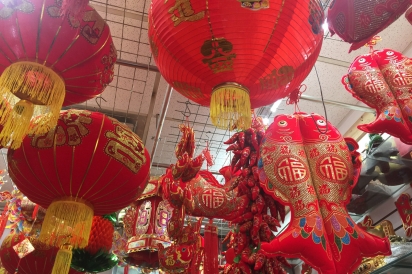 A local flower shop on Roosevelt Avenue sells traditional Lunar New Year decorations.