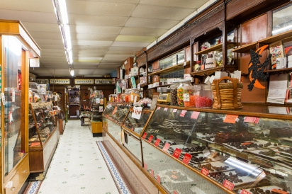 The store interior has some of its original showcases at Schmidts in Woodhaven, Queens.