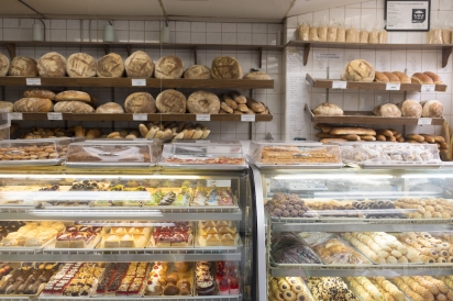 Tempting pastries and bread at Gian Piero Bakery in Long Island City Queens New York.
