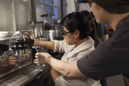 Long Island City high school student learning about coffee at Birch Coffee in Long Island City.