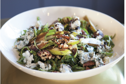 The Queen's Room's Pear Salad arugula, blue cheese, roasted pecans, balsamic reduction
