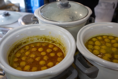 Fish balls in curry, ready to be served atop rice rolls at Joe’s Steam Rice Roll in Flushing.