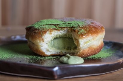 Matcha Creme Brulee doughnuts, dusted with matcha green tea powder at Black Label Donuts in Bayside.