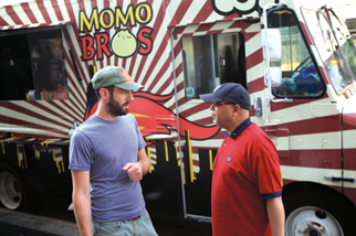 Jeff Orlick, founder of the Momo Food Crawl, checking in at the Momo Bros. Food Truck in Jackson Heights.