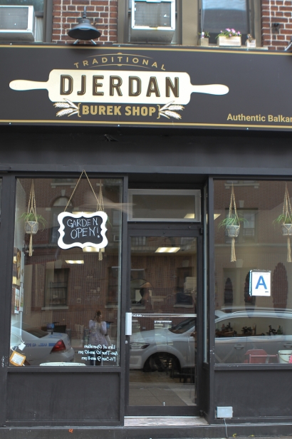 Out front of Djerdan, who offers Balkan cuisine, in Astoria.