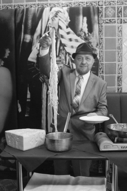 Undated photos from George’s, showing John Valentino with six-foot spaghetti, and film star Gloria Swanson