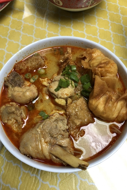 Bowl of curry laksa, Malaysian breakfast noodle soup, at Curry Leaves